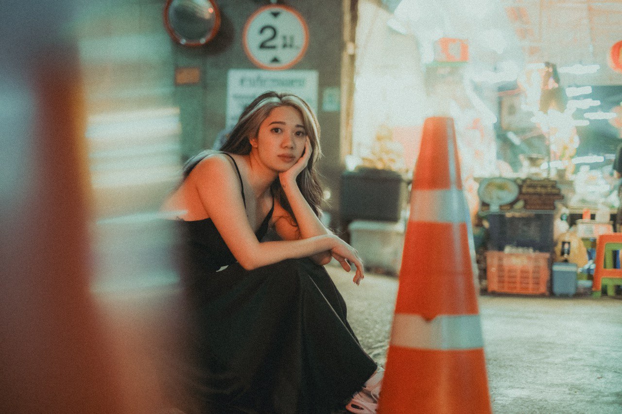 Lydia, founder and tattoo artist at TattByLyds, creating custom fine line tattoos in Singapore